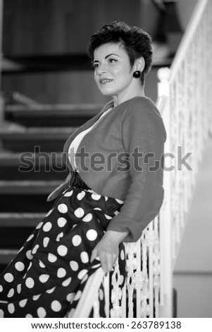 Photo session of an expressive,short haired brunette woman. Black and white photography