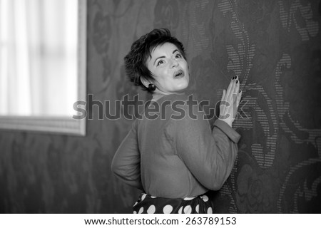 Photo session of an expressive,short haired brunette woman. Black and white photography