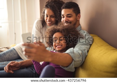 African american family making a selfie together.