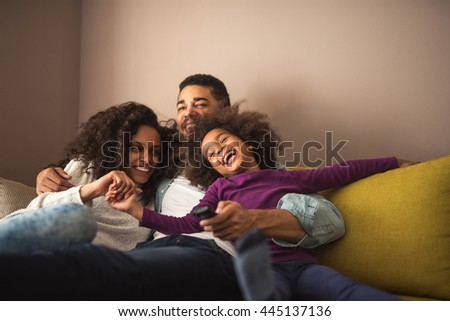Cute african american family enjoying time together.