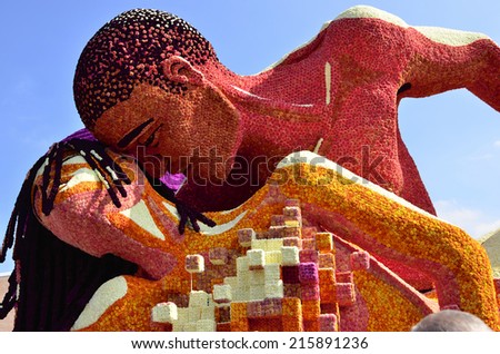 Flower parade Zundert, The Netherlands, one of the participating entries of 2014; a tender loving couple
