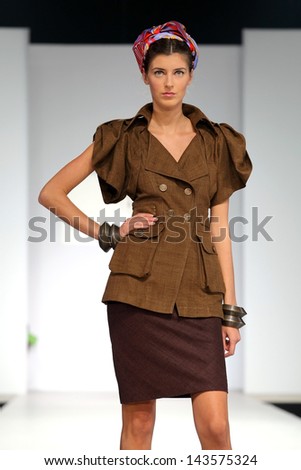 MOSCOW - OCTOBER 20: Model on podium during show of Valentin Yudashkin Collection as part of Fashion Week,, on October 20, 2010, Moscow, Russia