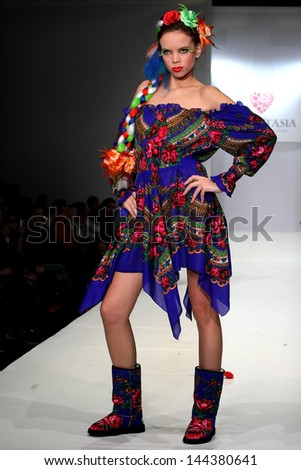 MOSCOW - OCTOBER 18: A model displays a creation by Russian designer Yanastasia Collection for Spring/ Summer 2011 during RFW October 18, 2010 in Moscow, Russia