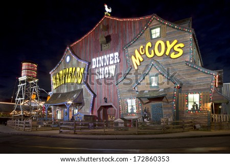 PIGION FORGE, TN- January 9: The unique facade of the Hatfield & McCoy Dinner Show Theater make it a landmark and major tourist attraction in Pigeon Forge, Tennessee on January 9, 2014
