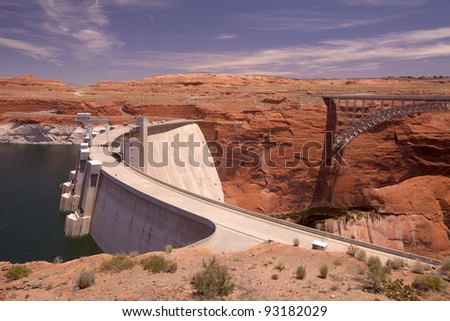 The Glen Canyon Dam is the second largest dam and Glen Canyon Dam bridge on the Colorado River at Page, Arizona, USA.The dam formed  Lake Powell. The Dam is a 710 feet high concrete arch dam.