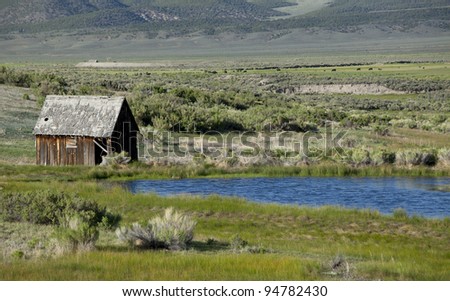 Old ranch house and pond in Utah