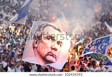 KYIV, UKRAINE - MAY 10: FC Dynamo Kyiv team supporters show their support with big portrait of famous Valeriy Lobanovskyi during Ukraine Championship game against FC Tavriya on May 10, 2012 in Kyiv