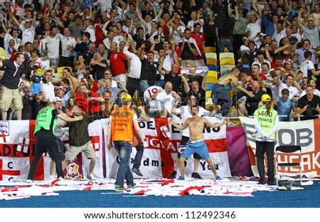 KYIV, UKRAINE - JUNE 15: England fans celebrate after scoring against Sweden during their UEFA EURO 2012 game at NSC Olympic stadium on June 15, 2012 in Kyiv, Ukraine