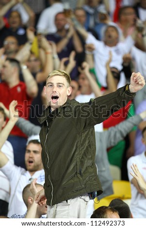KYIV, UKRAINE - JUNE 15: English fan reacts after England beat of Sweden during their UEFA EURO 2012 game at NSC Olympic stadium on June 15, 2012 in Kyiv, Ukraine