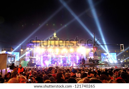 BERLIN, GERMANY - JANUARY 1, 2012: New 2012 Year celebrations taking place at Pariser Platz near Brandenburg Gate on January 1, 2012 in Berlin