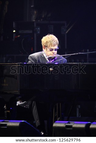 KYIV, UKRAINE - JUNE 30: Singer Sir Elton John performs onstage during charity Anti-AIDS concert at the Independence Square on June 30, 2012 in Kyiv, Ukraine