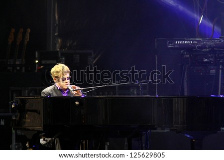 KYIV, UKRAINE - JUNE 30: Singer Sir Elton John performs onstage during charity Anti-AIDS concert at the Independence Square on June 30, 2012 in Kyiv, Ukraine