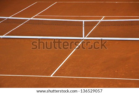 Empty clay tennis court during game time-out