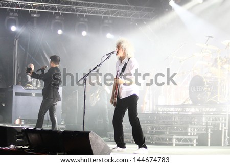 KYIV, UKRAINE - JUNE 30: Queen with Adam Lambert perform onstage during charity Anti-AIDS concert at the Independence Square on June 30, 2012 in Kyiv, Ukraine