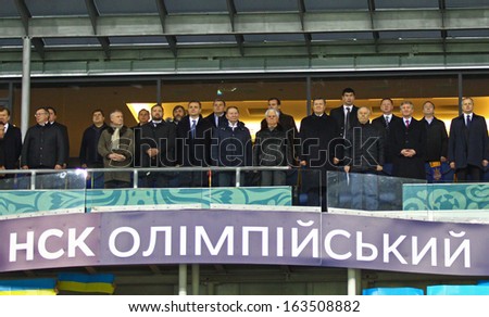 KYIV, UKRAINE - NOVEMBER 15: President of Ukraine Victor Yanukovich and other Ukrainian politics listen national anthem before FIFA World Cup qualifier game against France on November 15, 2013 in Kyiv