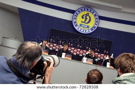 KYIV, UKRAINE - MARCH 9: Photographers take pictures during press-conference before UEFA Europa League game between Manchester City and FC Dynamo Kyiv on March 9, 2011 in Kyiv, Ukraine