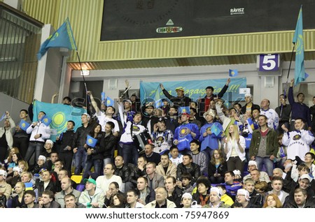 KYIV, UKRAINE - APRIL 23: Kazakhstan fans celebrate during IIHF Ice-hockey World Championship DIV I Group B game against Ukraine on April 23, 2011 in Kyiv, Ukraine