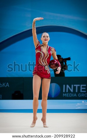 KYIV, UKRAINE - AUGUST 30, 2013: Alina Maksymenko of Ukraine performs during 32nd Rhythmic Gymnastics World Championship (Individual All-Around competition)