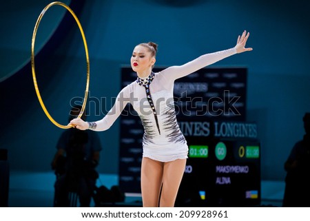 KYIV, UKRAINE - AUGUST 30, 2013: Alina Maksymenko of Ukraine performs during 32nd Rhythmic Gymnastics World Championship (Individual All-Around competition)