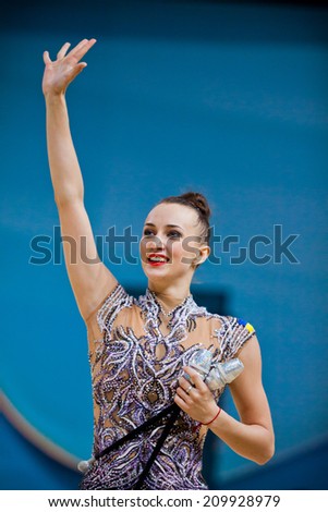 KYIV, UKRAINE - AUGUST 30, 2013: Ganna Rizatdinova of Ukraine performs during 32nd Rhythmic Gymnastics World Championship (Individual All-Ã?Â­Around competition)