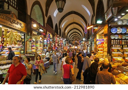 ISTANBUL, TURKEY - MAY 6, 2012: People shopping inside the Grand Bazar in Istanbul, one of the largest and oldest covered markets in the world