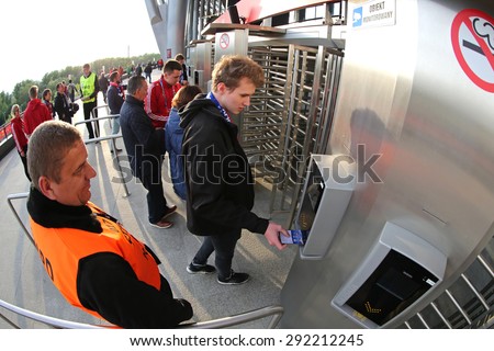 WARSAW, POLAND - MAY 27, 2015: People enter to the Warsaw National Stadium (Stadion Narodowy) before UEFA Europa League Final game between Dnipro and Sevilla