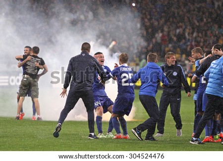 KYIV, UKRAINE - MAY 14, 2015: FC Dnipro players and coaches celebrate victory after UEFA Europa League semifinal game against Napoli at NSK Olimpiyskyi stadium