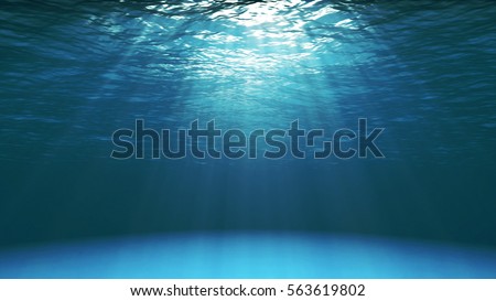 Dark blue ocean surface seen from underwater. Abstract Fractal waves underwater and rays of sunlight shining through