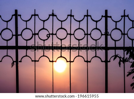 sunset and Fence creates a nice silhouette and background.