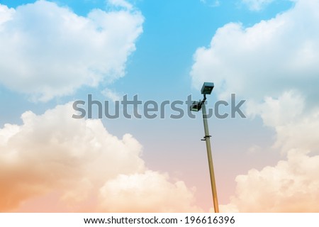 Street Light On Blue Sky and White Clouds with blue and orange filter