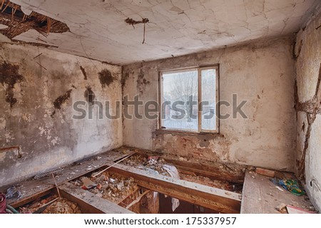 Ruins of a room on the floor with broken floor