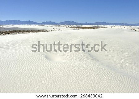 Gypsum Vista  - white sand or gypsum at White Sands National Monument in New Mexico with the mountains in the far distance