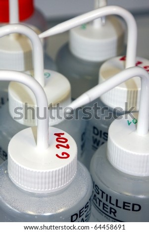 Plastic Bottles with Destilled Water in a Chemistry Lab