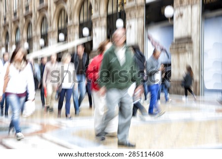 Blurred pedestrian, zoom effect