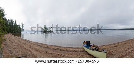 Canoe Ashore Next to Lake Opeongo in Algonquin Provincial Park, Ontario, Canada