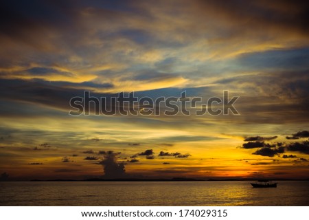silhouette background boats bewildering fantastic sunset over the sea with magic clouds