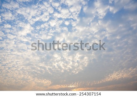 white clouds with blue sky on sunset