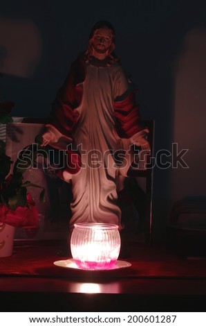 Jesus lit by candle