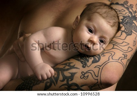 tattoo baby. stock photo : The aby on