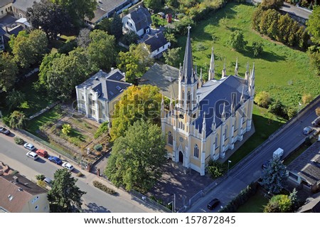 Erbach in Rheingau region from the air with the Protestant St. John\'s Church steeply from above from the gyrocopter.