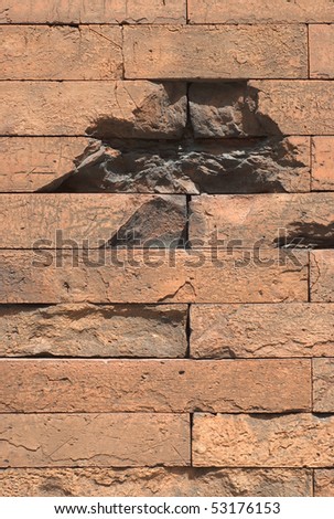 War Damaged Brick Wall as a Memorial