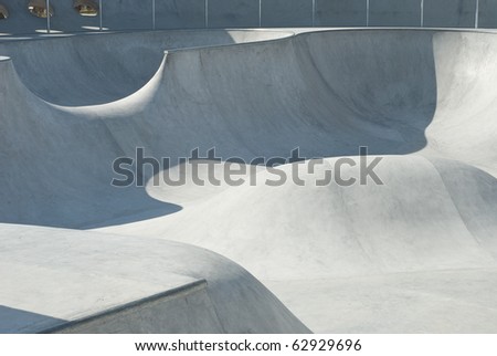 Concrete Skate and Bike Park with Tubes and Jumps