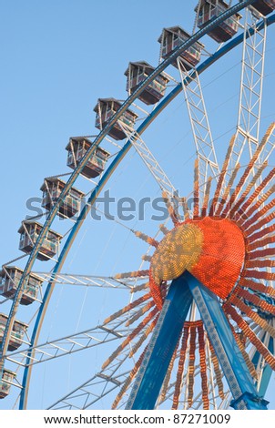 Large Ferris Wheel with Gondolas and Electric Lights