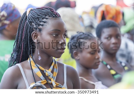 NAMPULA, MOZAMBIQUE - OCTOBER 11, 2014: Beautiful young girl of macua ethnicity. Daily scenes from northern Mozambique