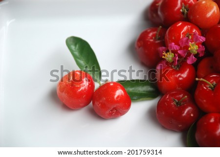 Small red fruit . Brazilian Acerola Fruit . small cherry