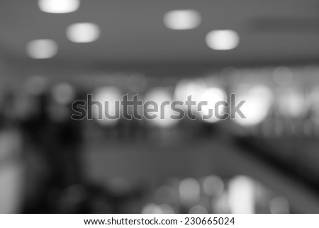 Department store blurred background with bokeh,defocused light in department store,gray abstract background.
