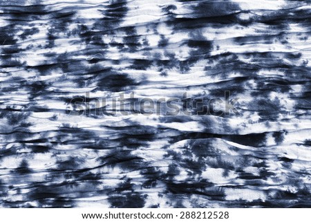 tie dyed pattern on cotton fabric abstract background.