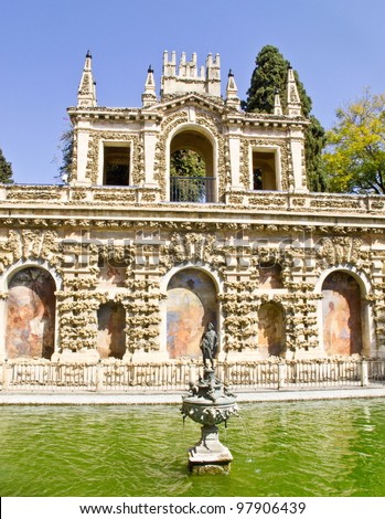 Figure fountain in the yard of the real palaces in Seville