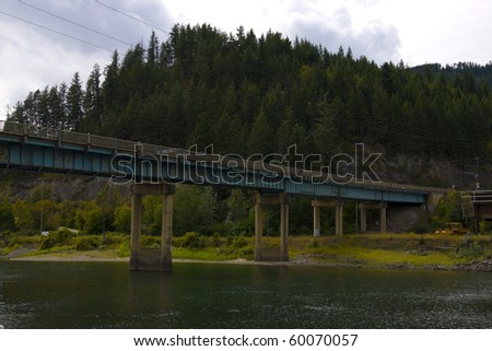 Old Steel Bridge over water located in Sicamous, British Columbia, Canada