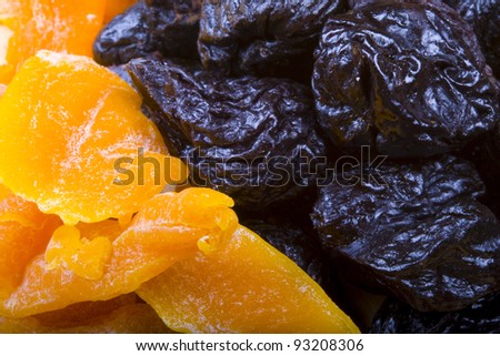 Collected different kinds of dried fruits: prunes, and mango